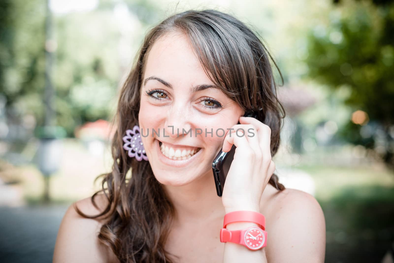 beautiful woman on the phone in the city