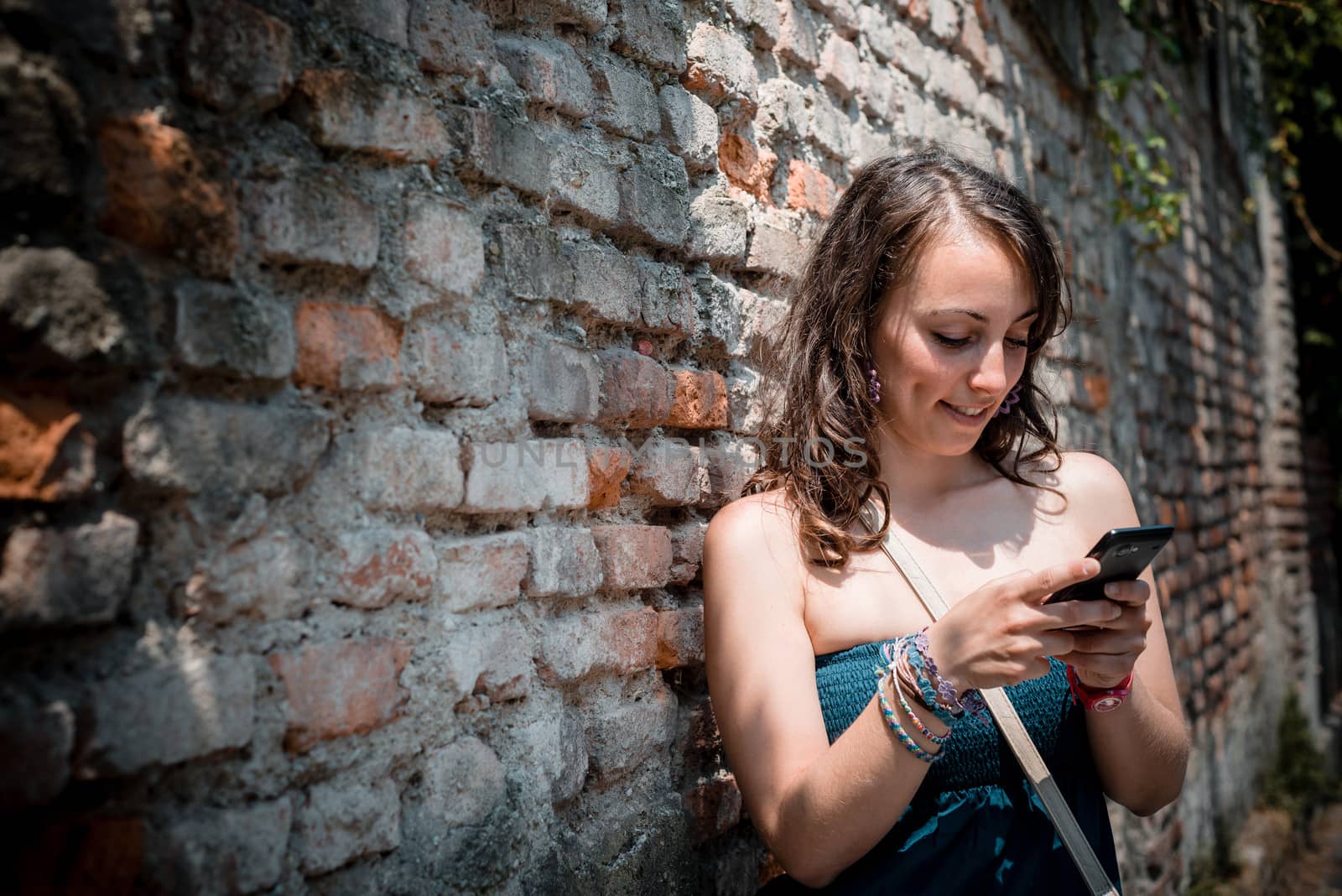 beautiful woman on the phone in the city