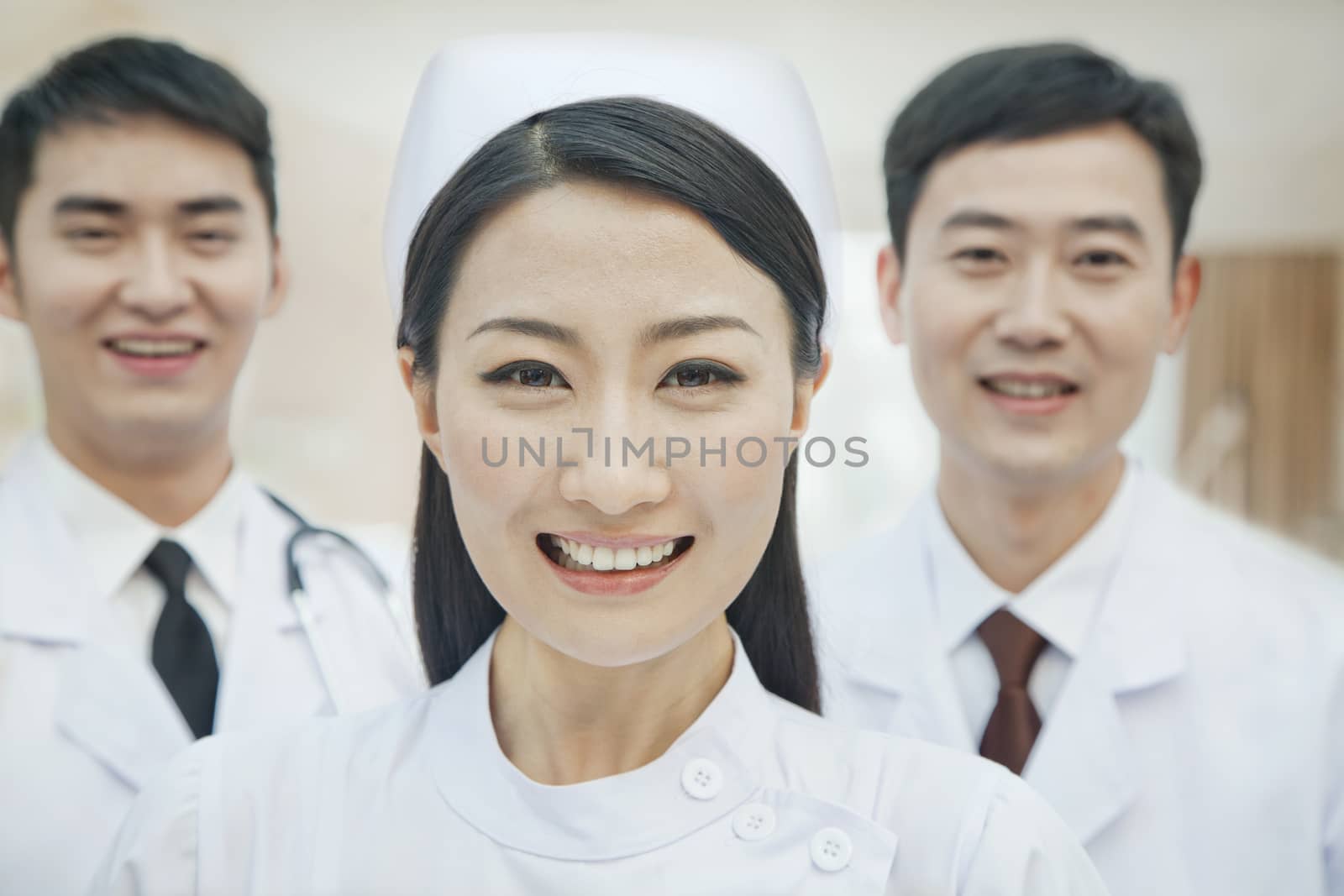 Portrait of Healthcare workers in China, Two Doctors and Nurse by XiXinXing