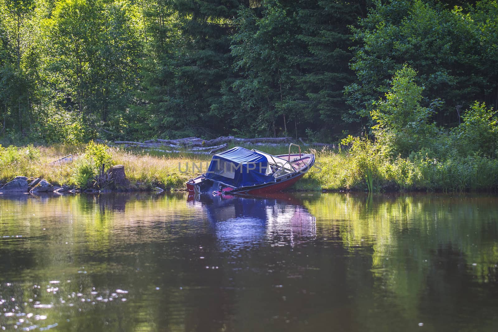 in a river at five sea, sunken boat by steirus