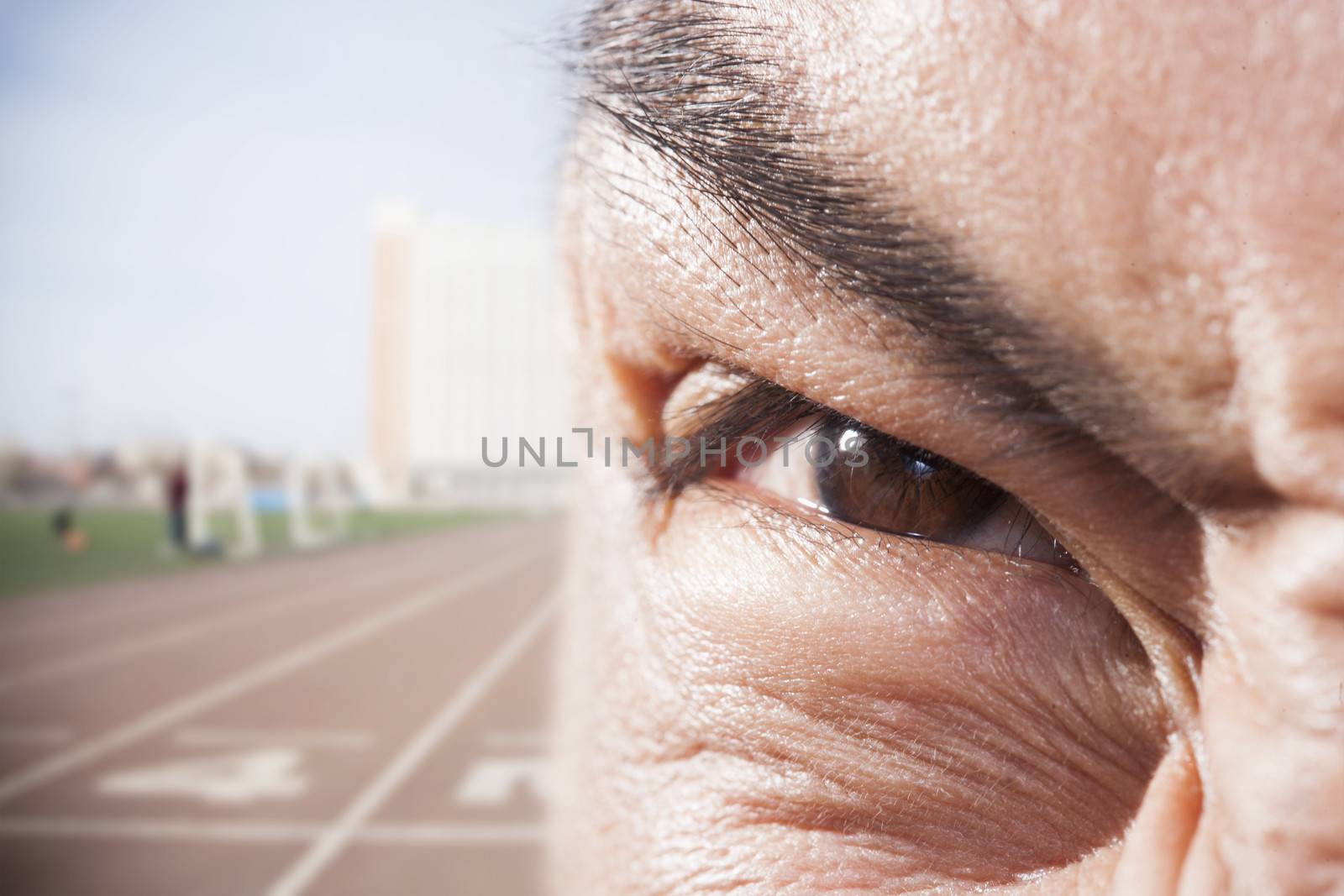 Athlete's eye with angry expression, close-up