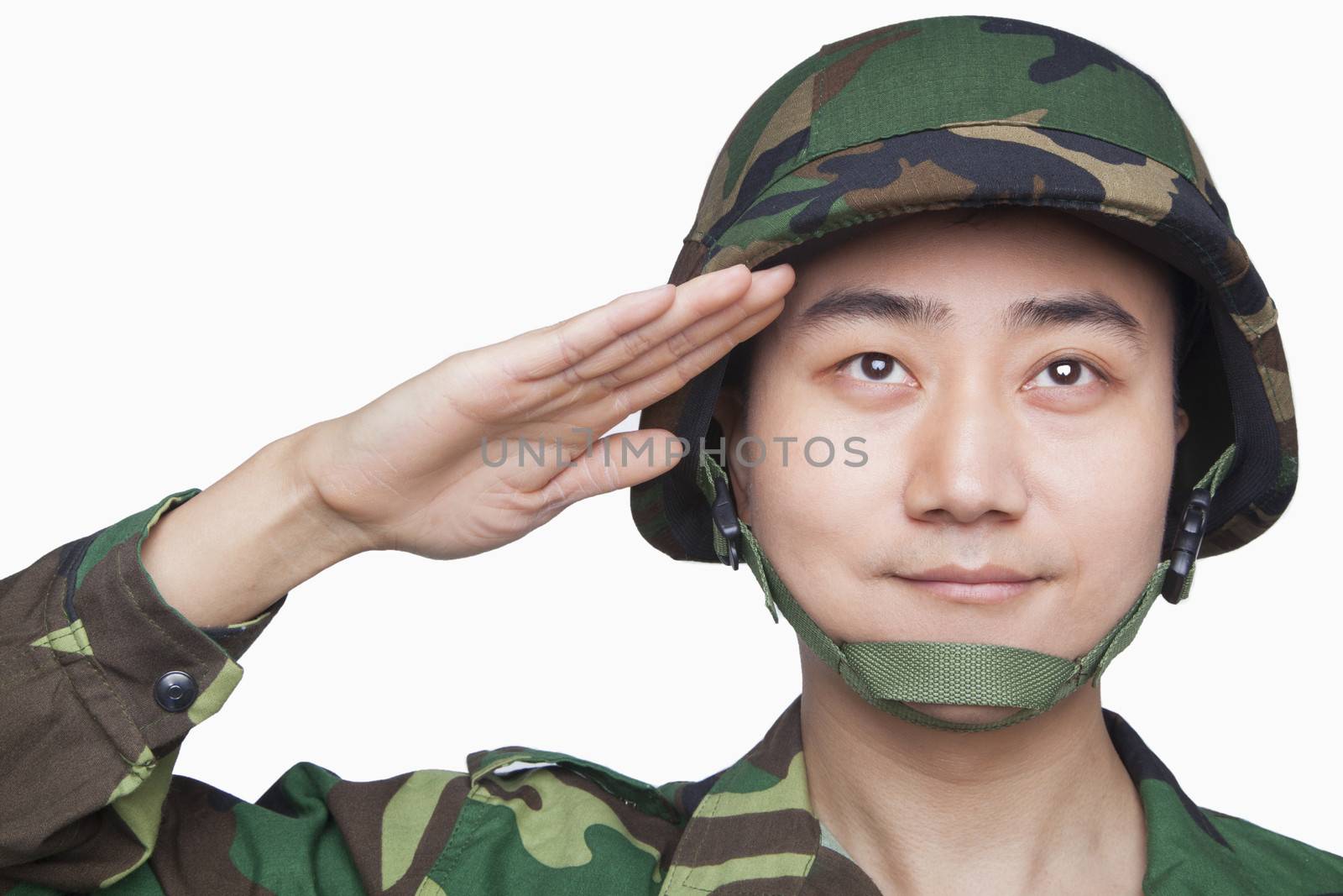 Man in military uniform saluting