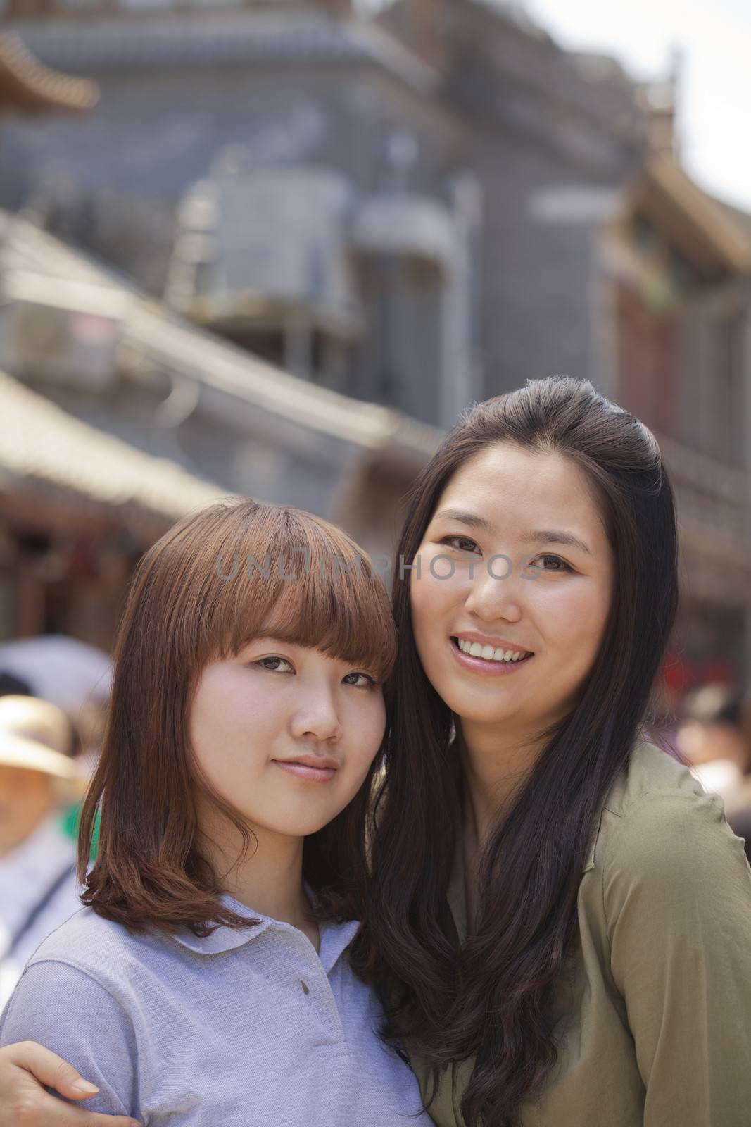 Portrait of two young girls in Beijing outdoors by XiXinXing