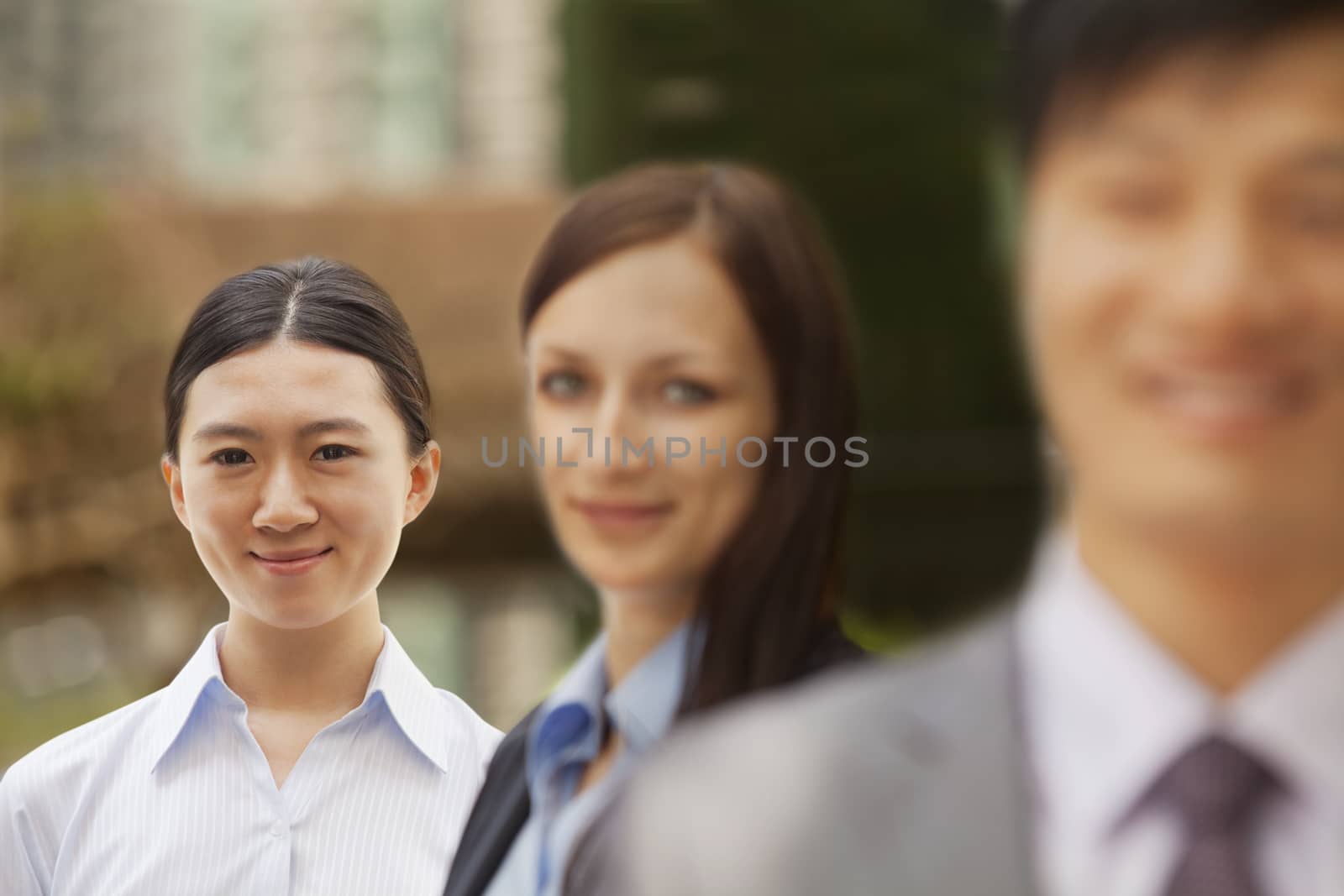 Portrait of three business people, multi-ethnic group