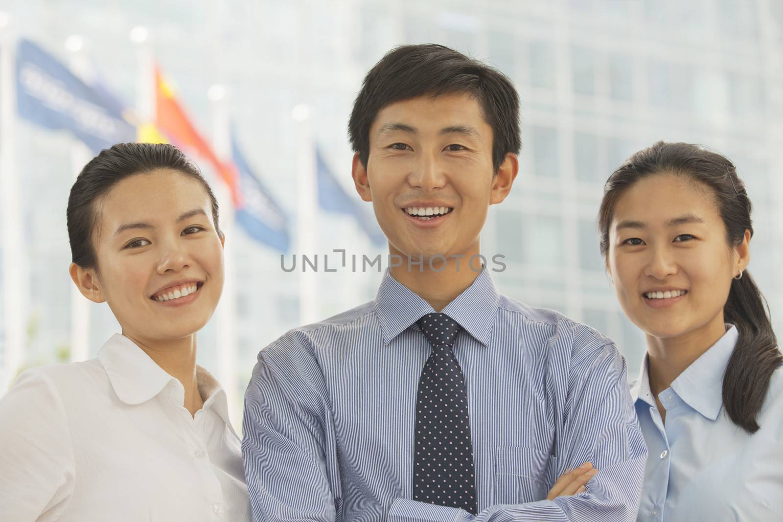 Portrait of three young business people, Beijing 
