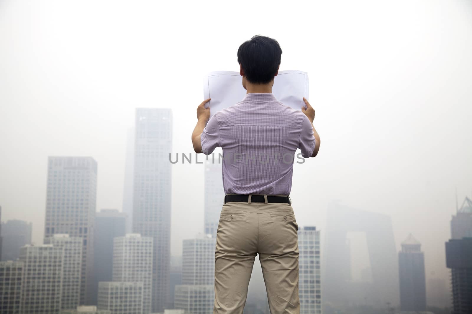 Mid Adult Man In Front Of Cityscape