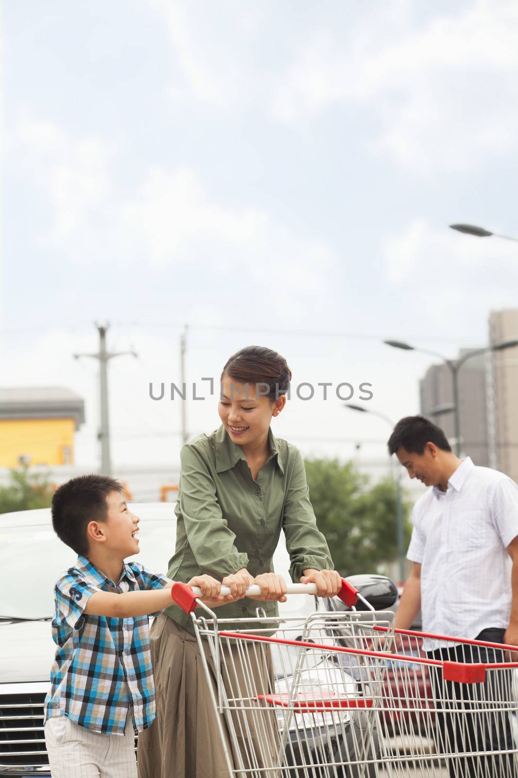 Family with shopping cart by XiXinXing