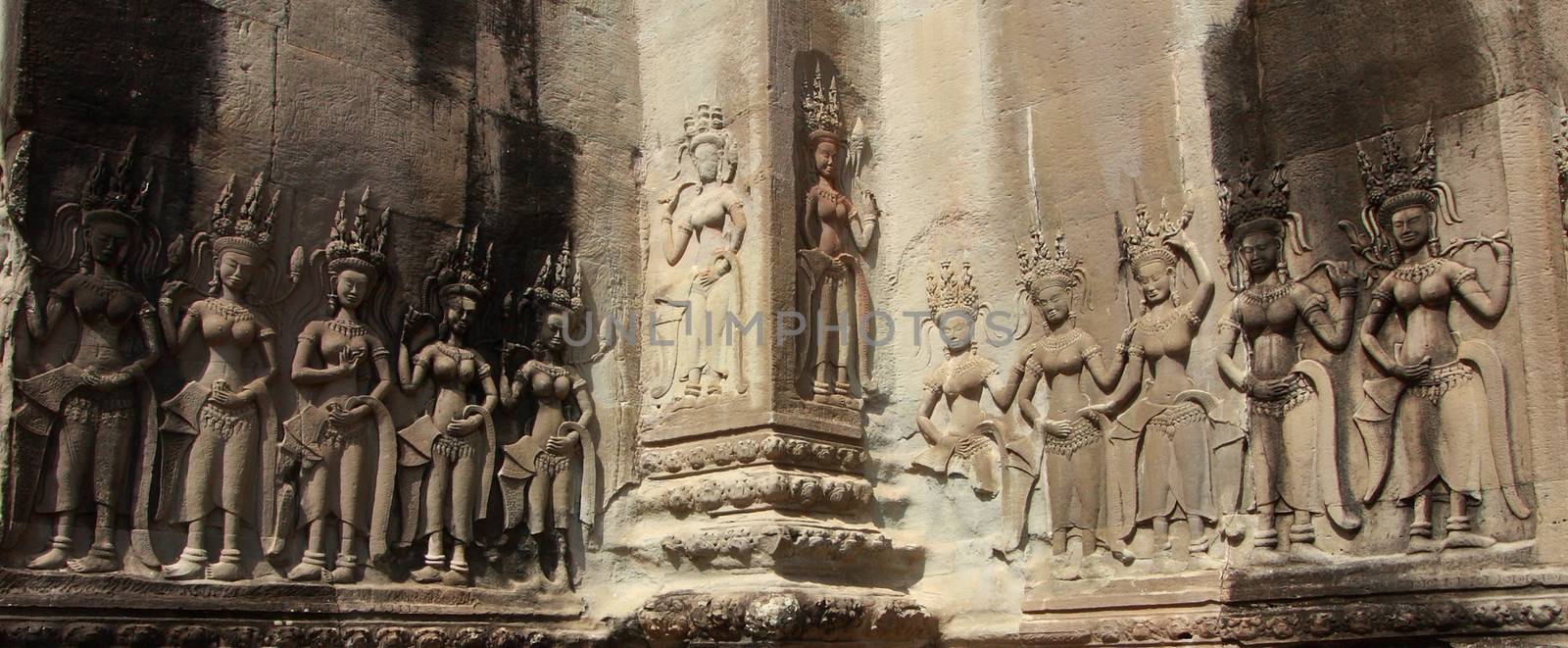 Apsara all around on the wall at Angkor wat. 