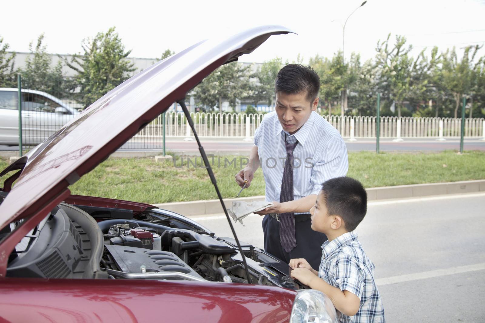 Father and Son Check the Oil on Their Car by XiXinXing