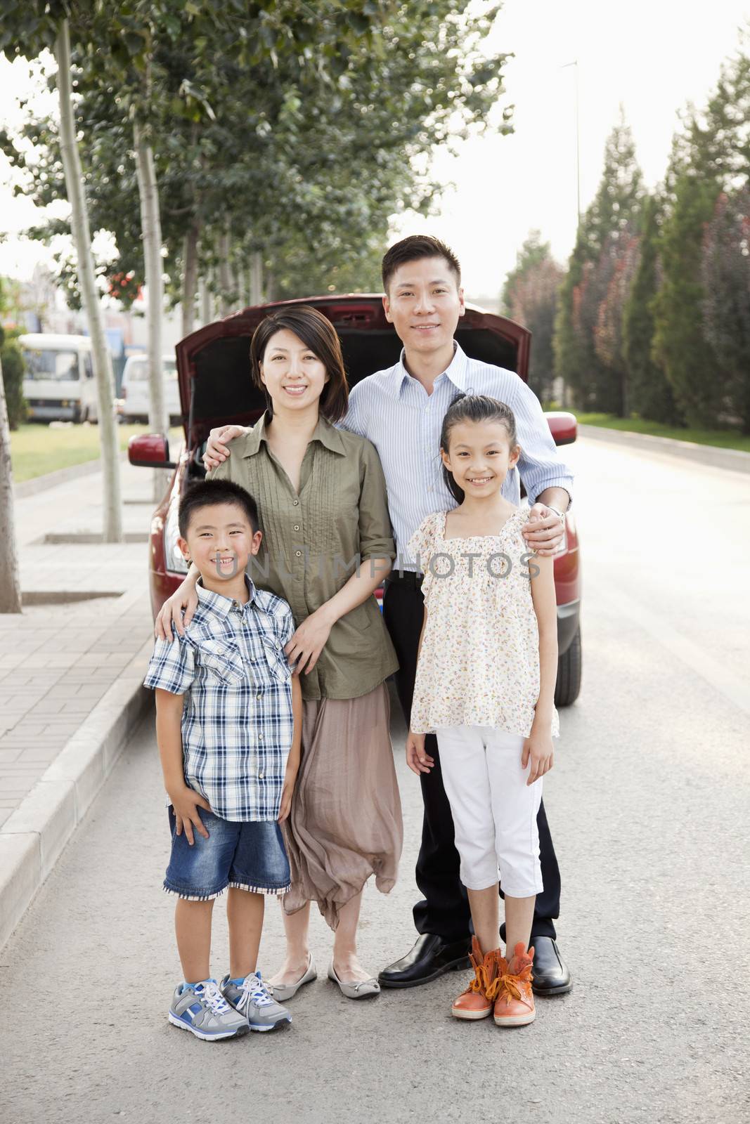 Family Portrait in Front of Car on Roadside by XiXinXing