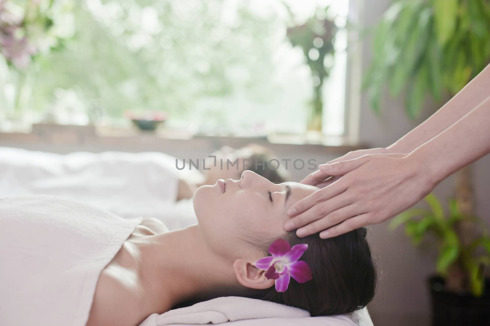 Women Receiving Head Massage