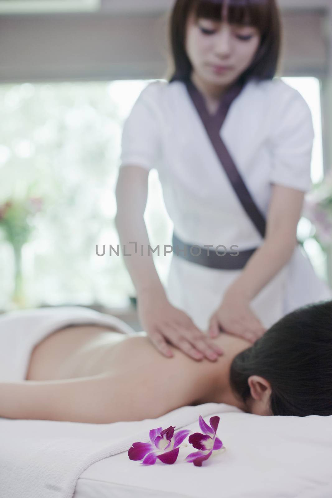 Woman Receiving Massage by XiXinXing