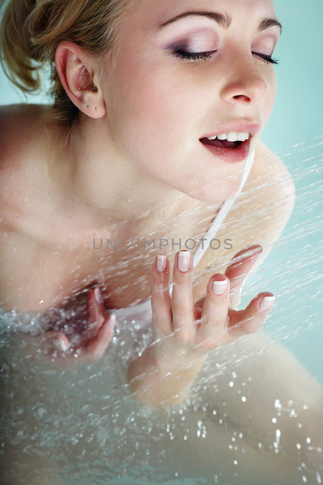 Portrait of the beautiful lady taking a shower