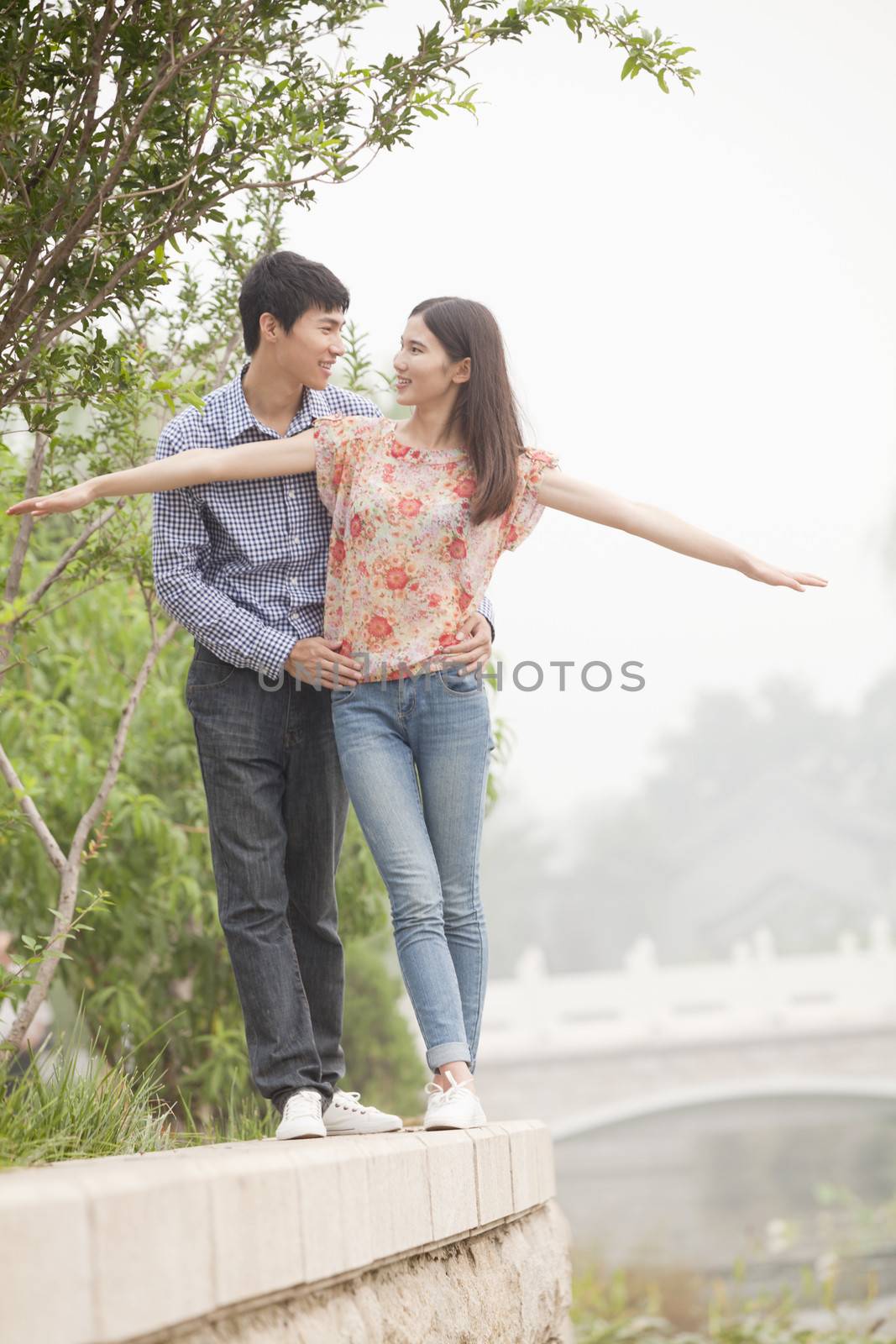 Boyfriend and Girlfriend by a Canal by XiXinXing