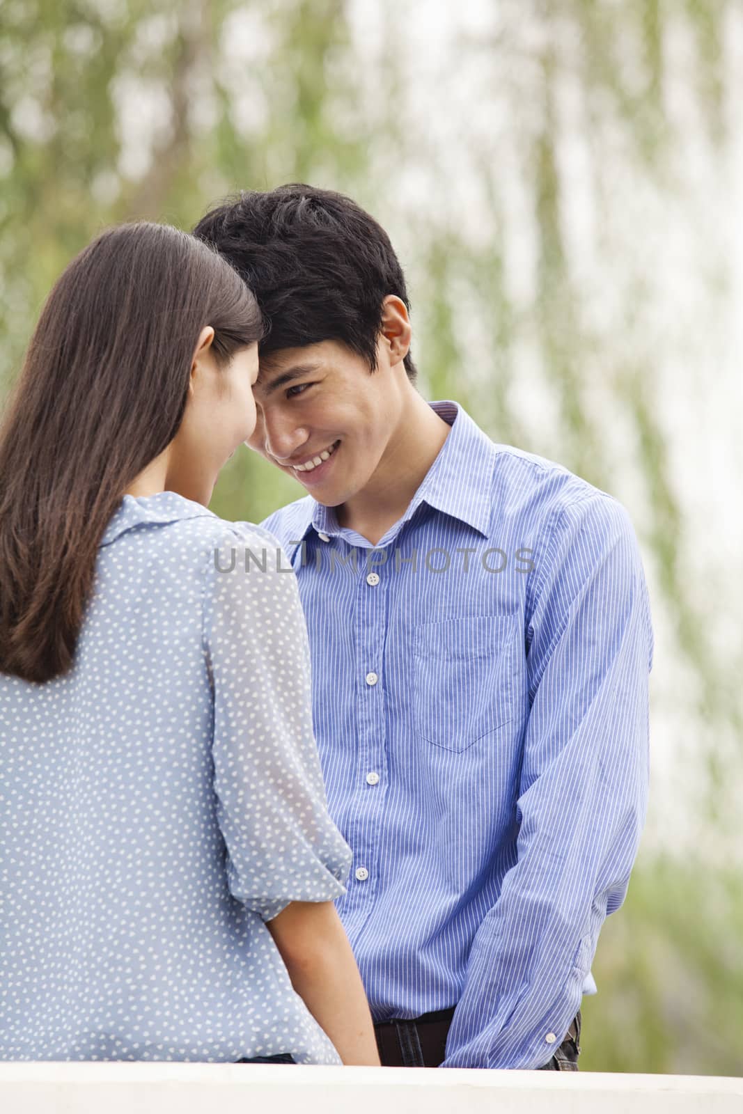 Young Couple Touching Foreheads