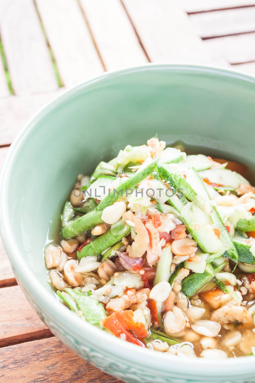 Thai style cucumber spicy salad on the bowl, stock photo