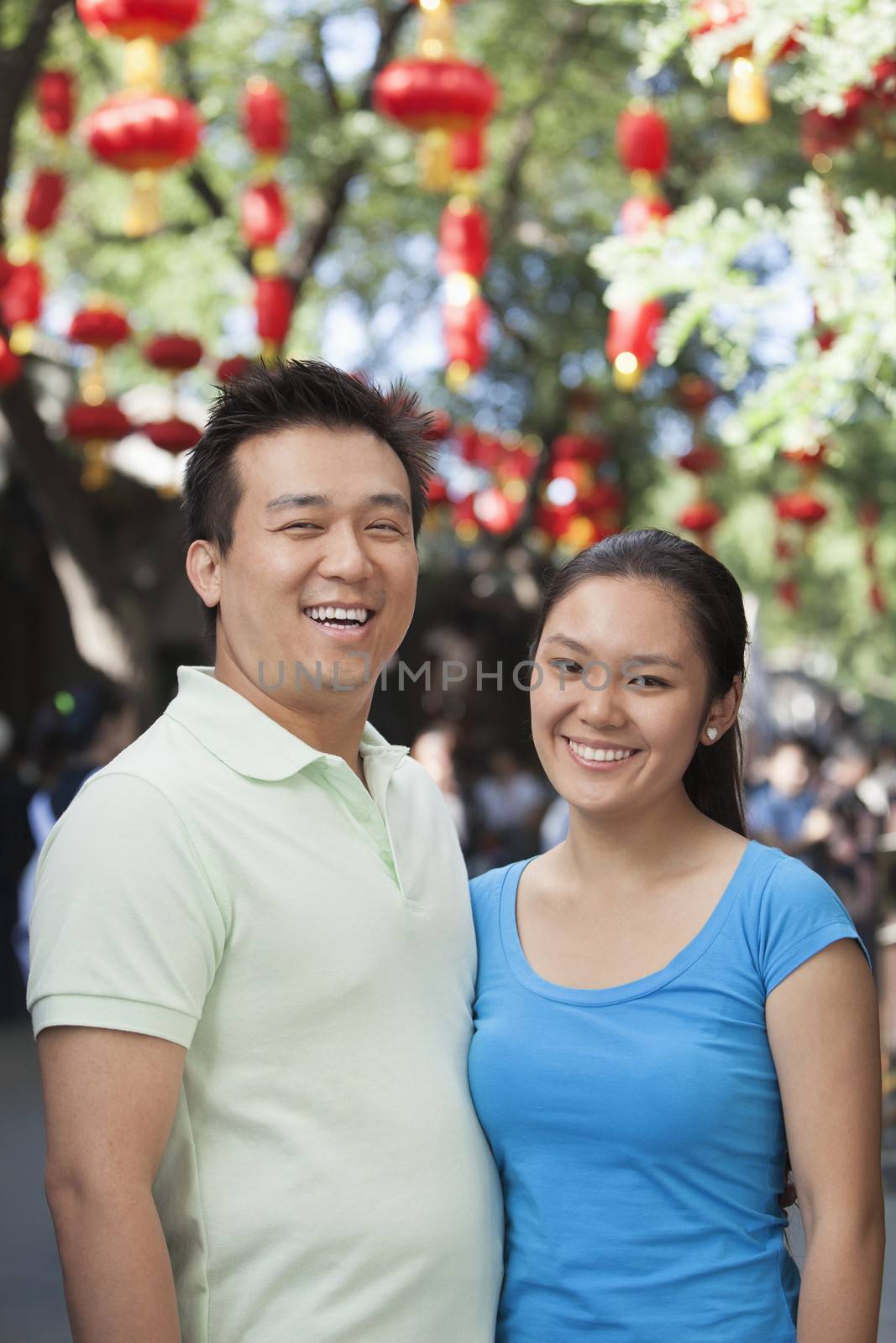 Portrait Of Smiling Couple In Nanluoguxiang, Beijing by XiXinXing