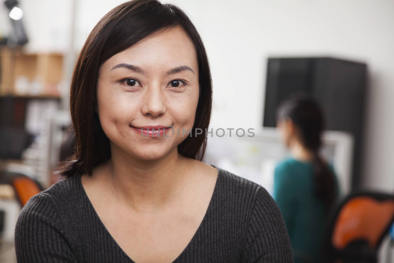 Portrait of mid adult businesswoman in the office