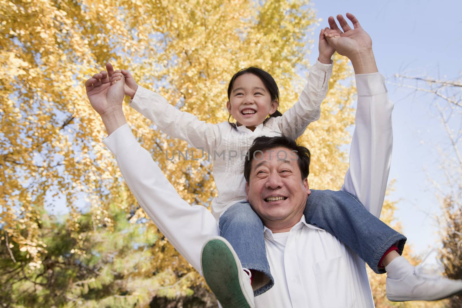 Grandfather Carrying Granddaughter on His Shoulders by XiXinXing