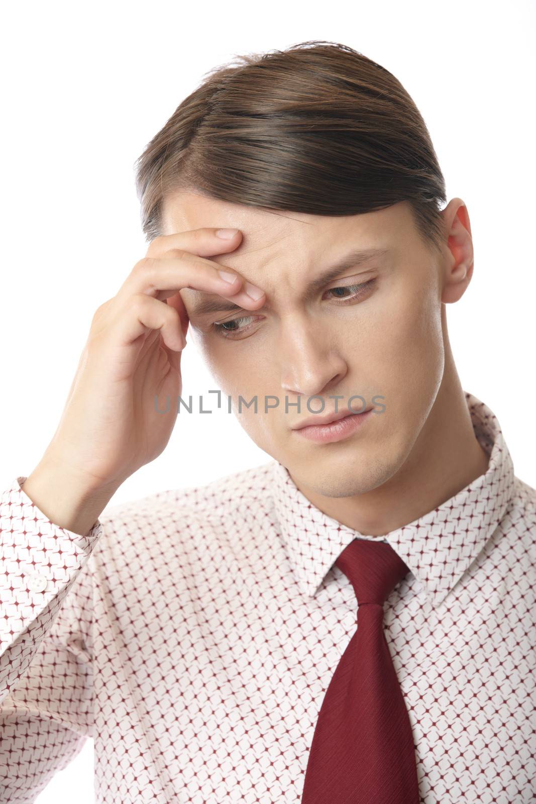 Businessman suffering from the headache and emotional stress