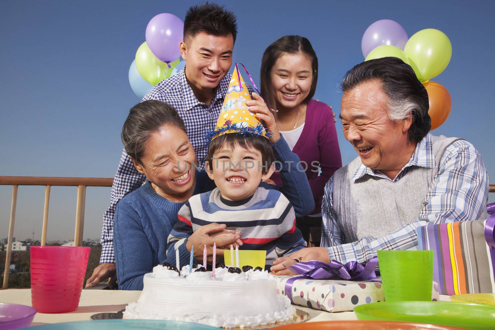 Birthday part, multi-generation family  by XiXinXing