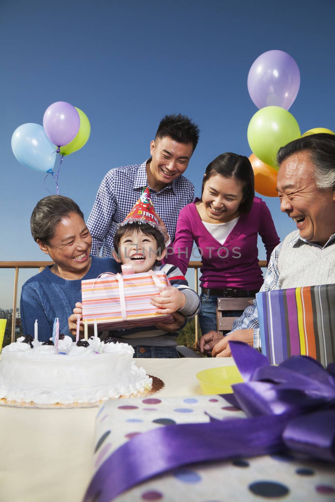 Birthday part, multi-generation family 