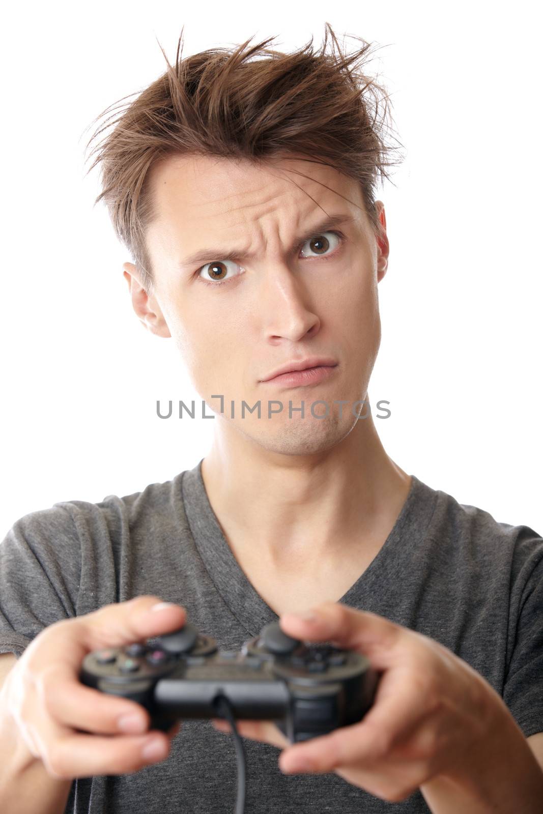 Man playing computer game and using joystick on a white background