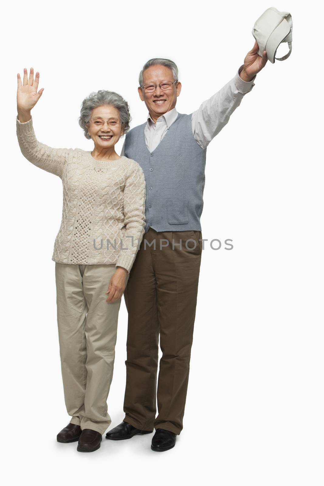 Senior couple waving goodbye by XiXinXing
