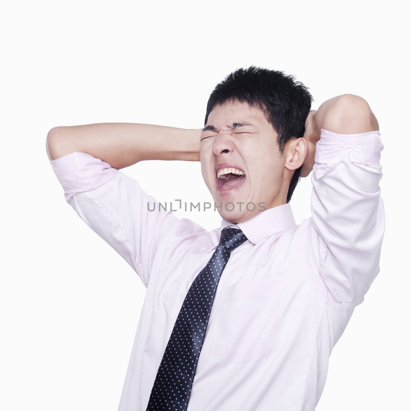 Frustrated businessman holding his head