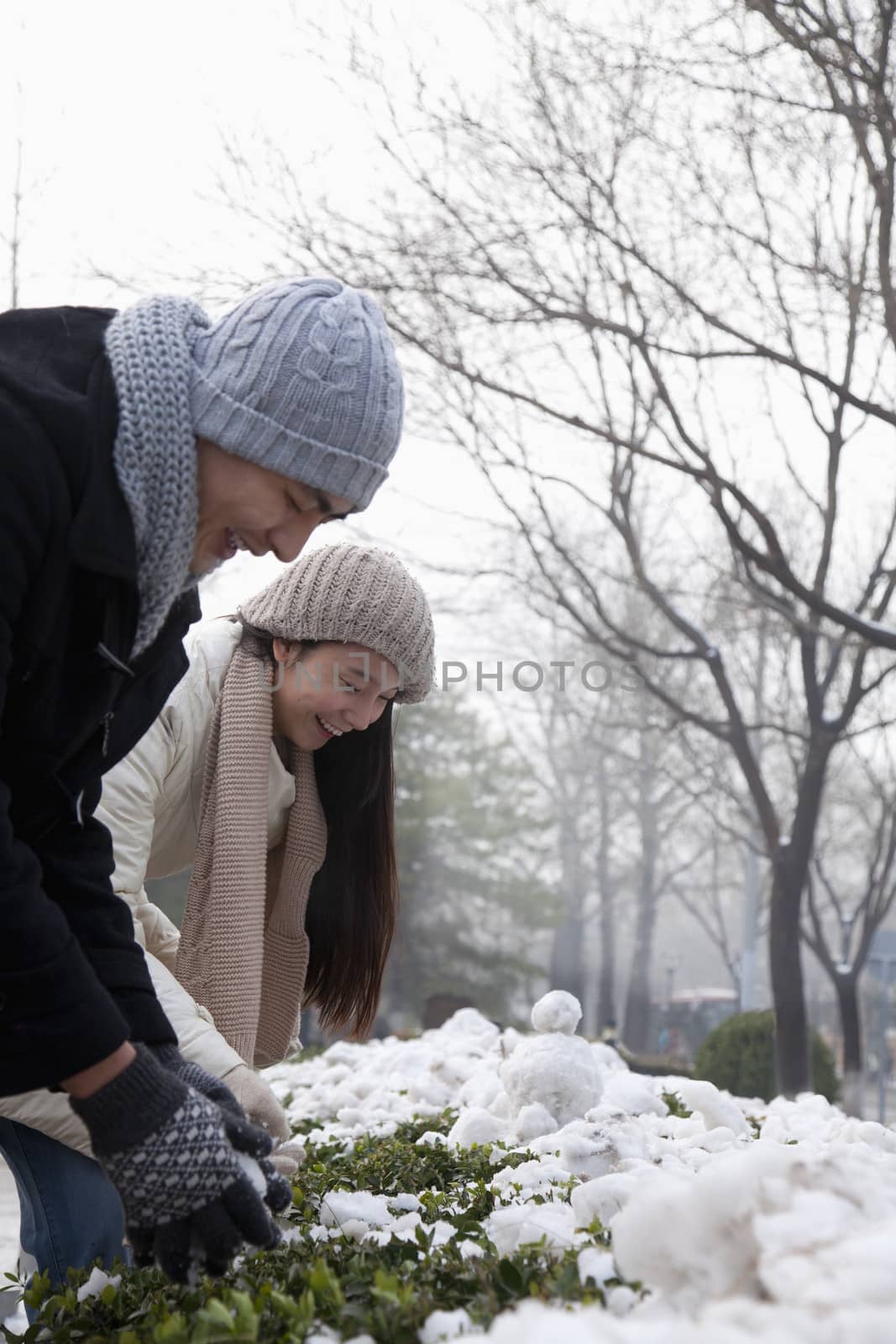 Couple Playing in the Snow
