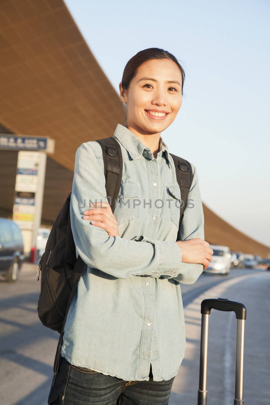 Young traveler portrait outside of airport