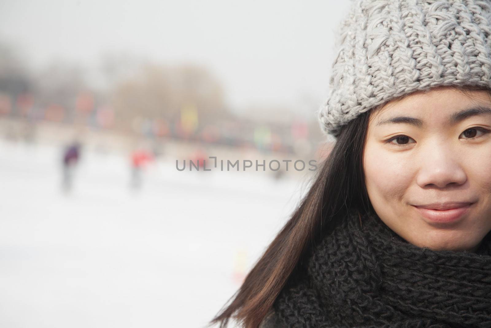 Young woman ice skating portrait, Beijing