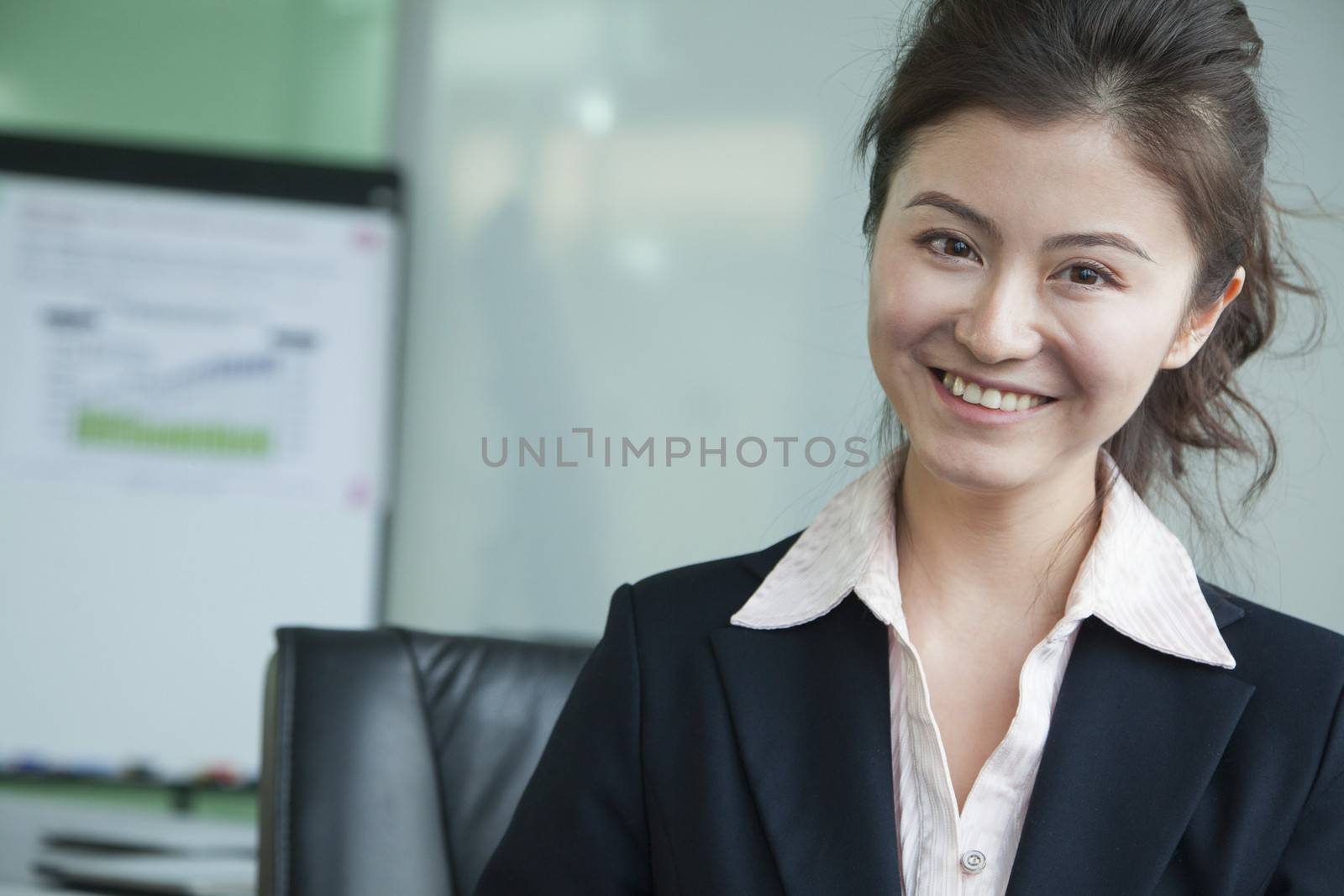 Businesswoman in meeting room portrait by XiXinXing