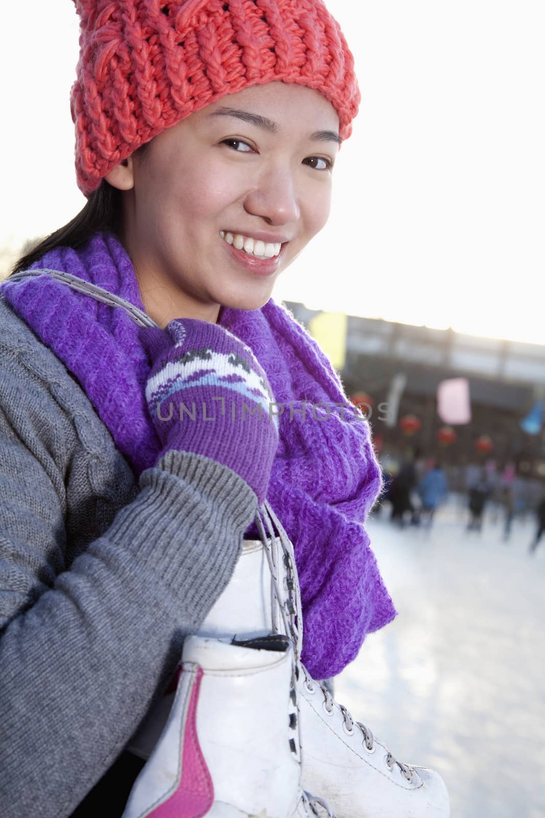 Young woman on ice rink