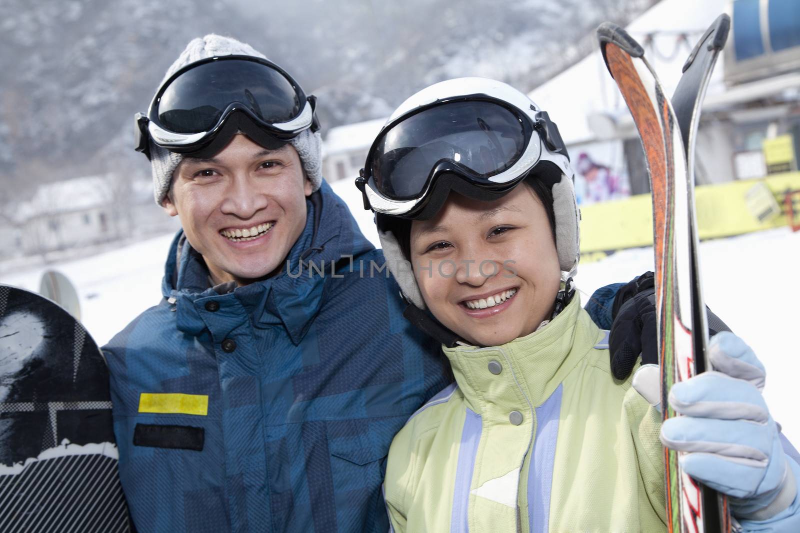 Smiling Couple in Ski Resort by XiXinXing