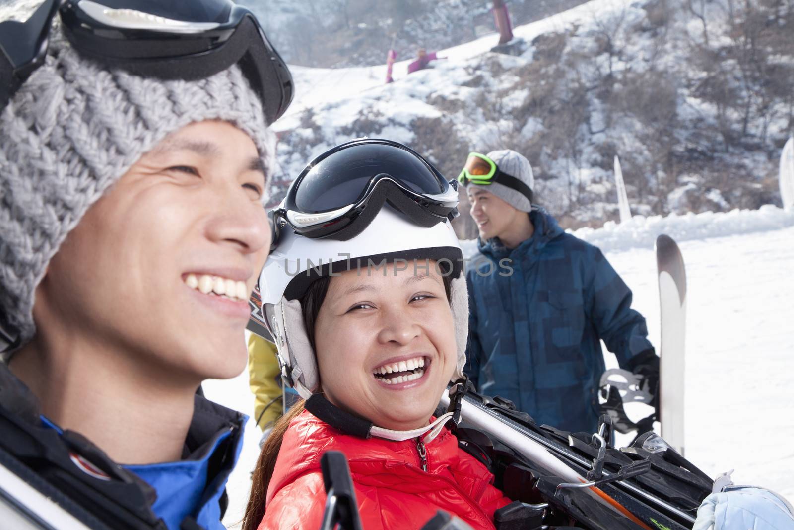 Smiling Couple in Ski Resort by XiXinXing