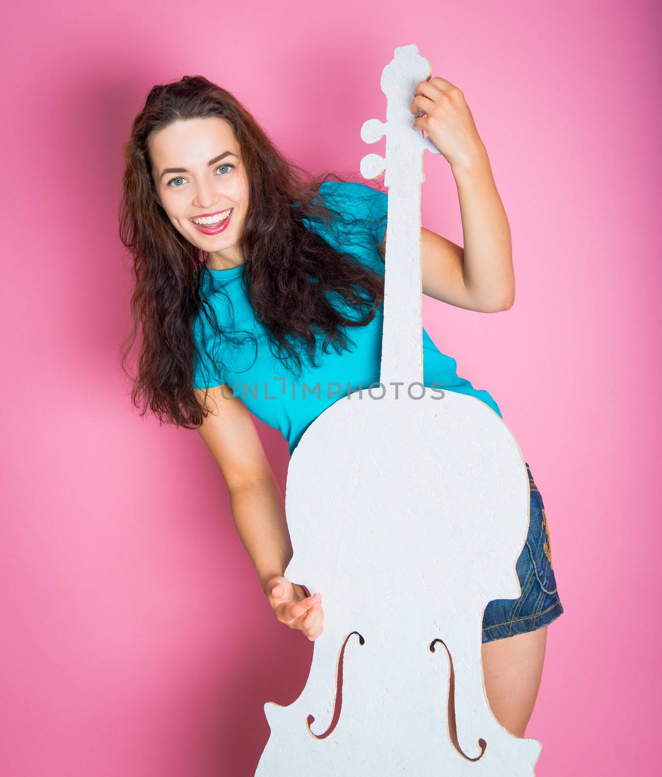 girl with white cello on a pink background