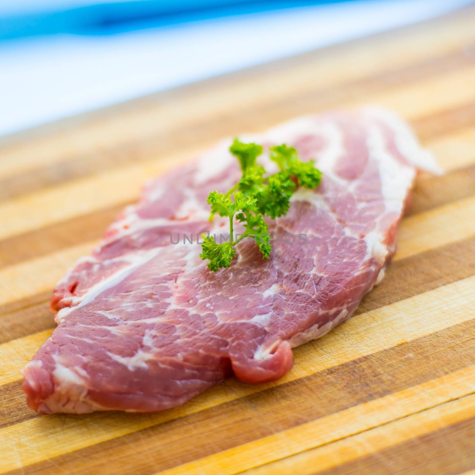 raw meat for steak on a cutting board