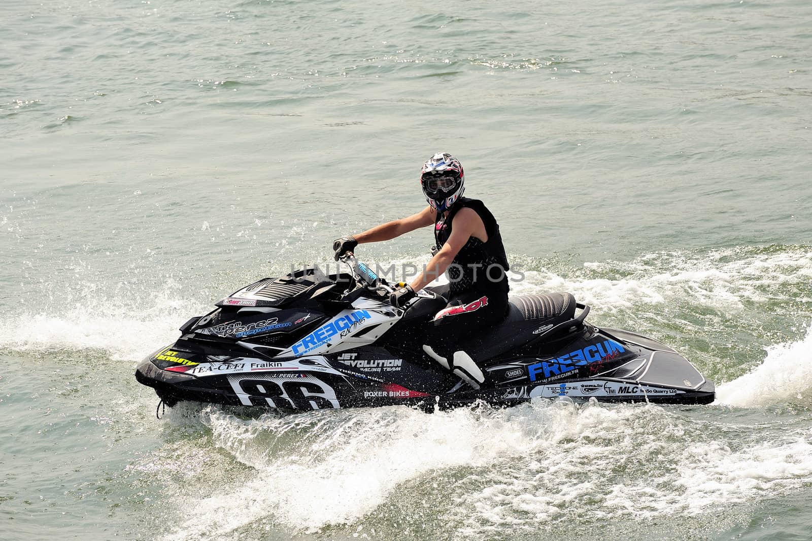 Ales - France - on July 14th, 2013 - Championship of France of Jet Ski on the river Gardon. Arrival in tight turn 