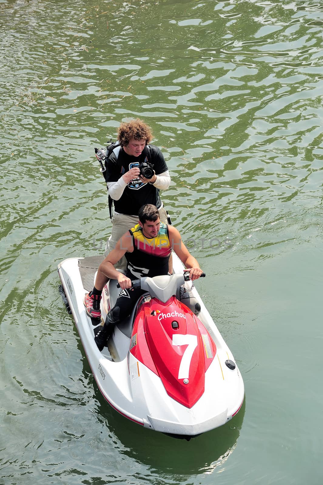 Ales - France - on July 14th, 2013 - Championship of France of Jet Ski on the river Gardon. Photographer on jet ski