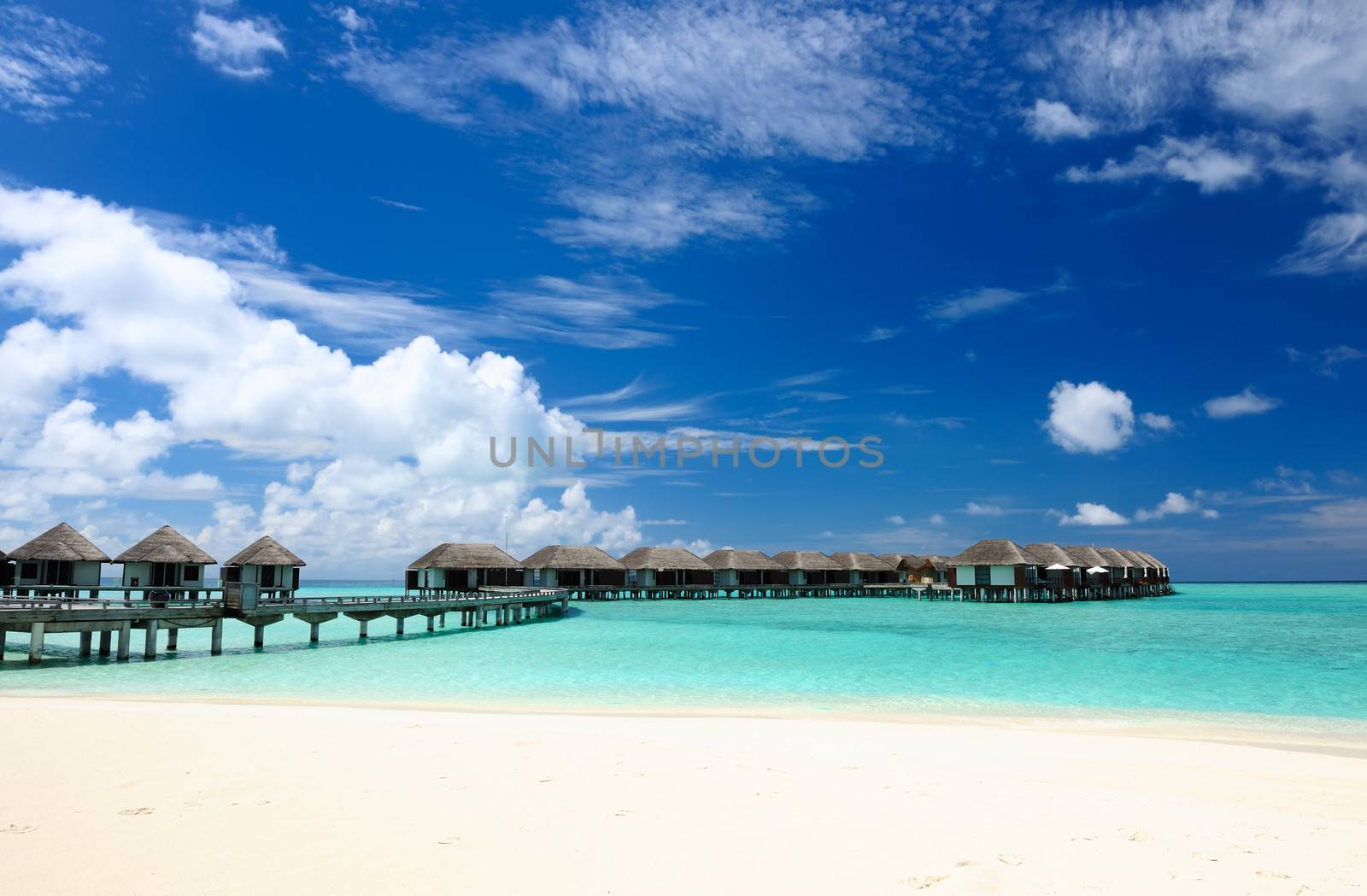 Beautiful beach with water bungalows at Maldives