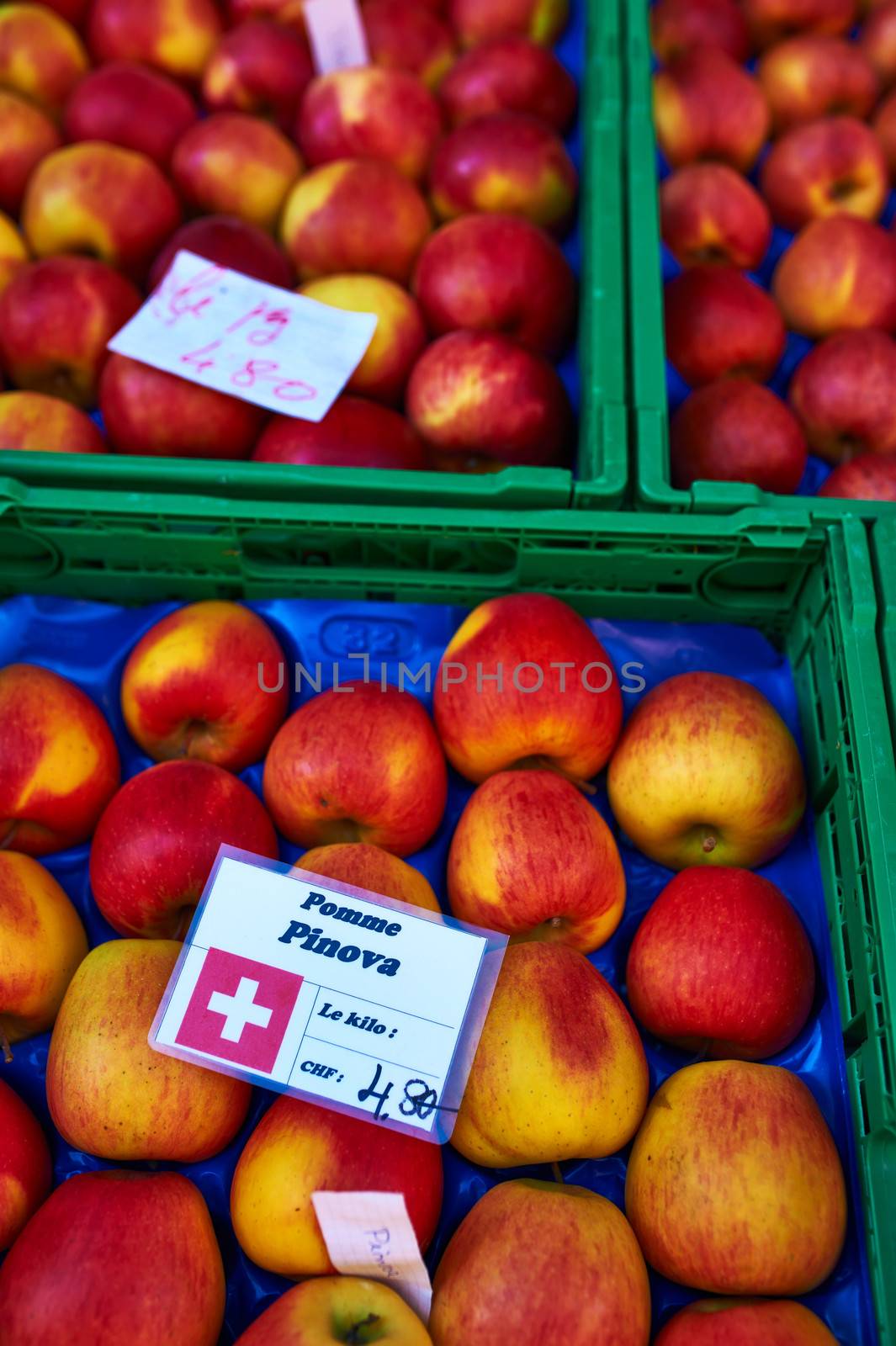 Baskets of fresh apples at street market
