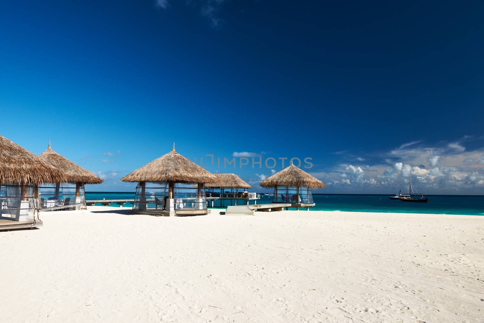 Beautiful beach with bungalow jetty at Maldives