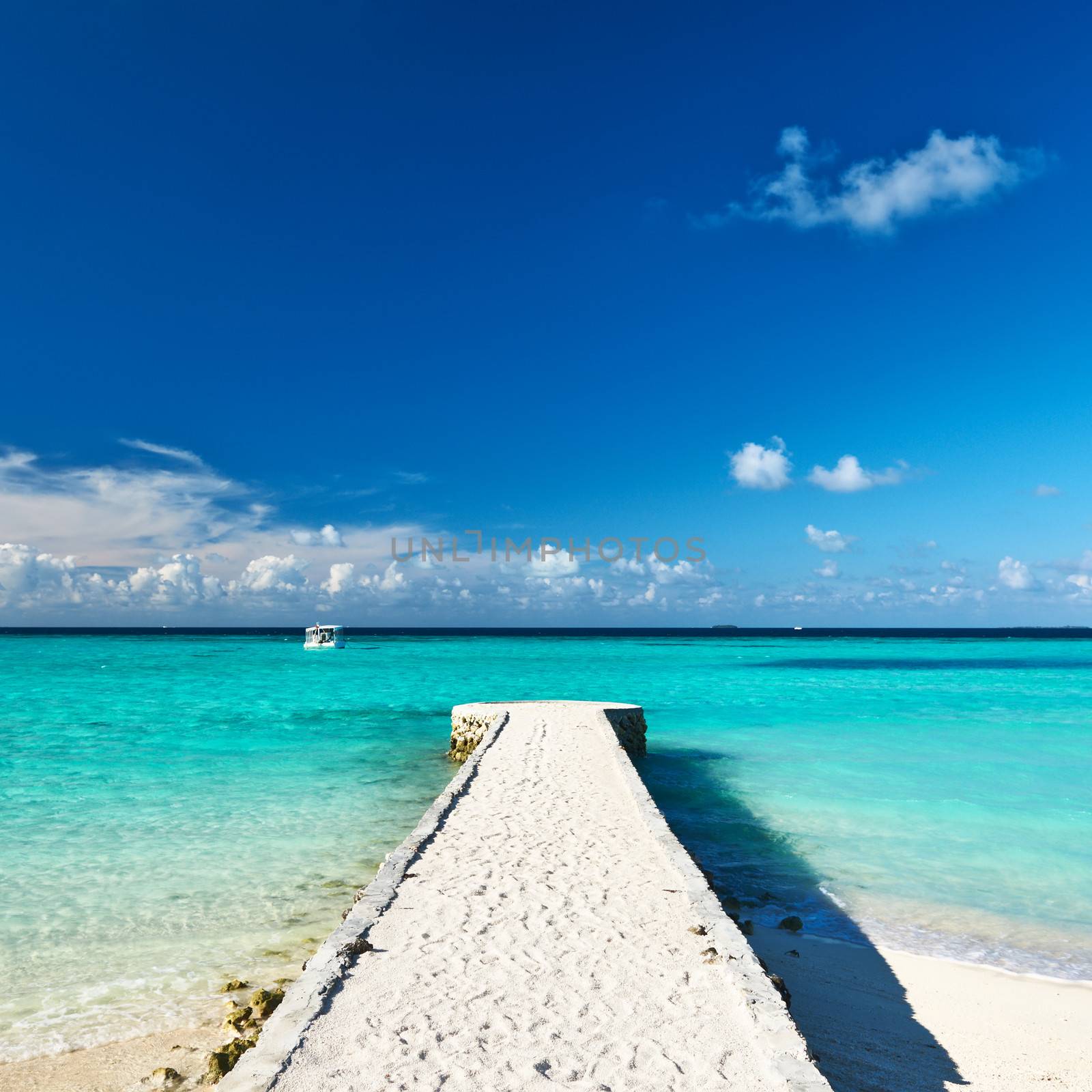 Beautiful beach with jetty at Maldives