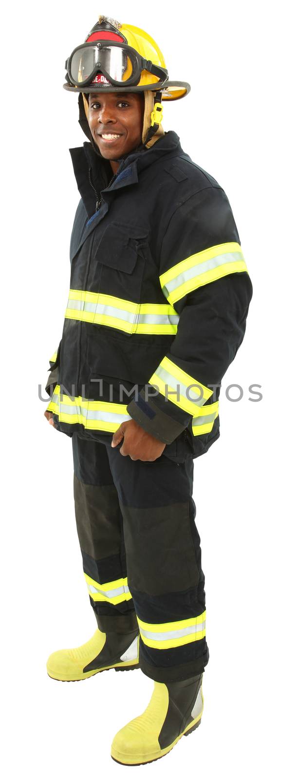 Attractive black middle aged man in fire fighter's uniform with clipping path.