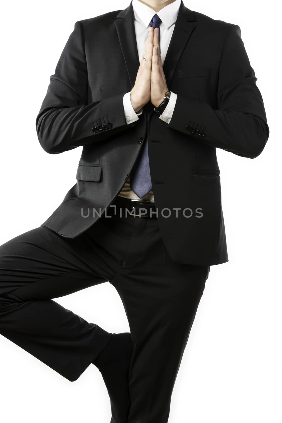 Businessman performs a yoga exercise by w20er