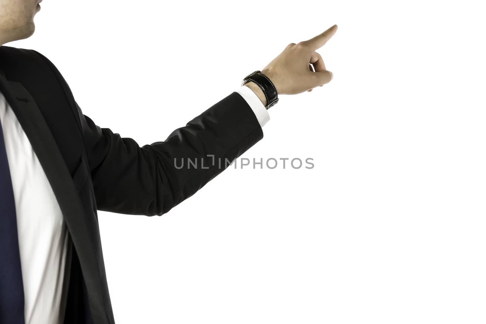 Businessman pointing with the left hand to the back