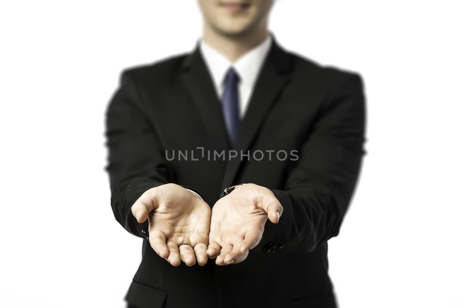 Businessman stretching out both hands to giving or receiving isolated on white background