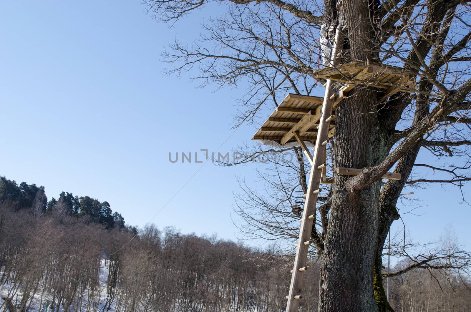 cable rope from hill to high playground site. extreme rope fall slide down activity equipment.