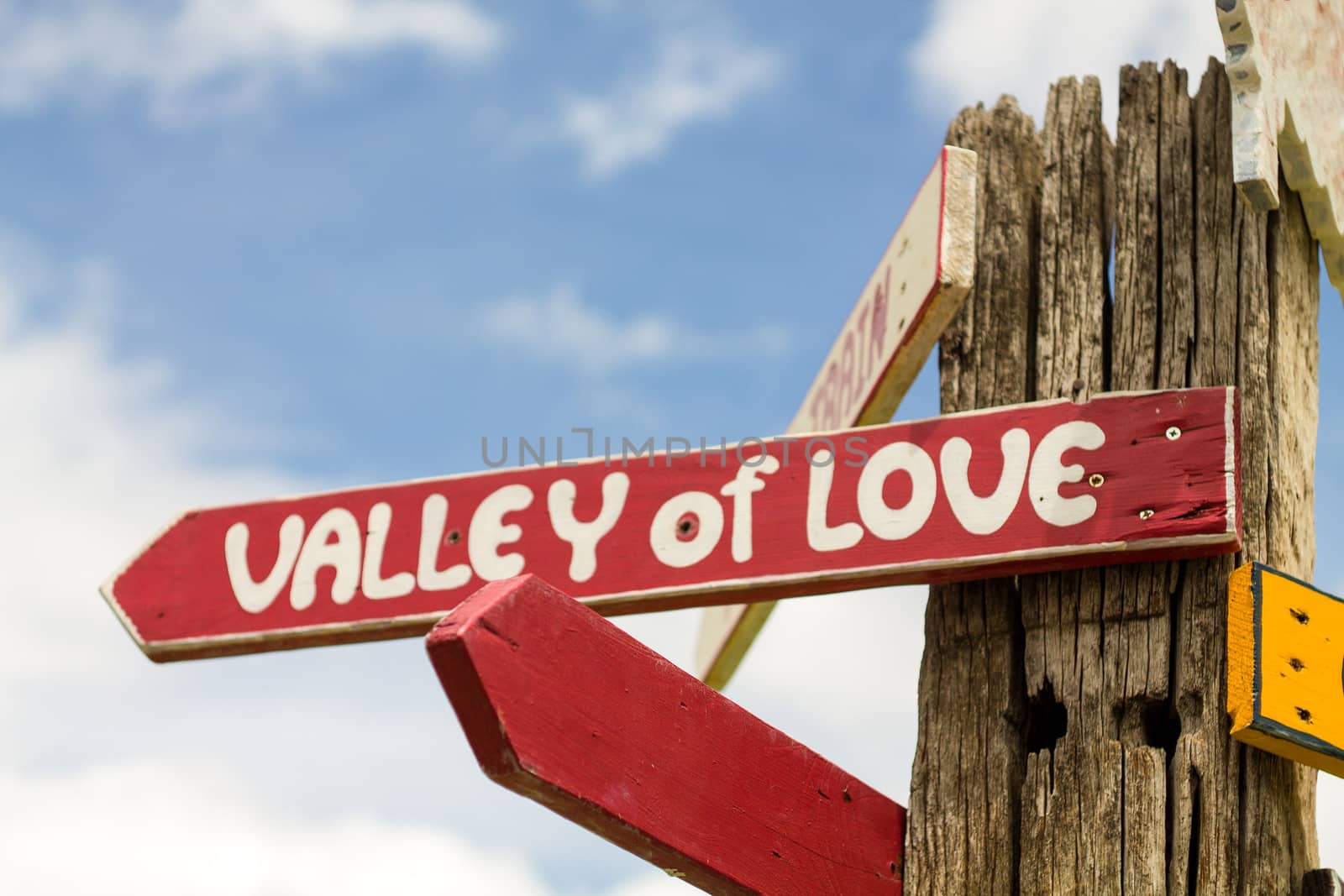 valley of love sign on wood pole